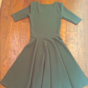 Green Lularoe Nicole quilted pattern dress.